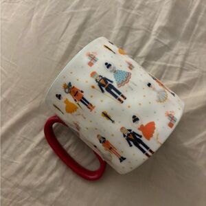 Festive Nutcracker Mug with Red Handle